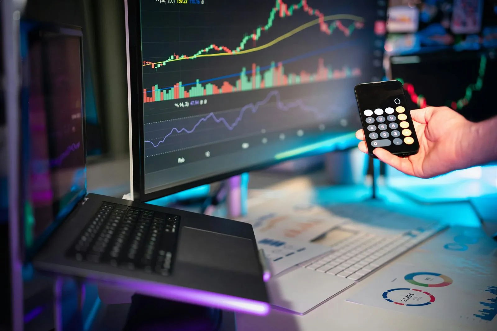 A fintech operator reviewing a payments dashboard — DORA applies to non-bank financial entities across the EU.